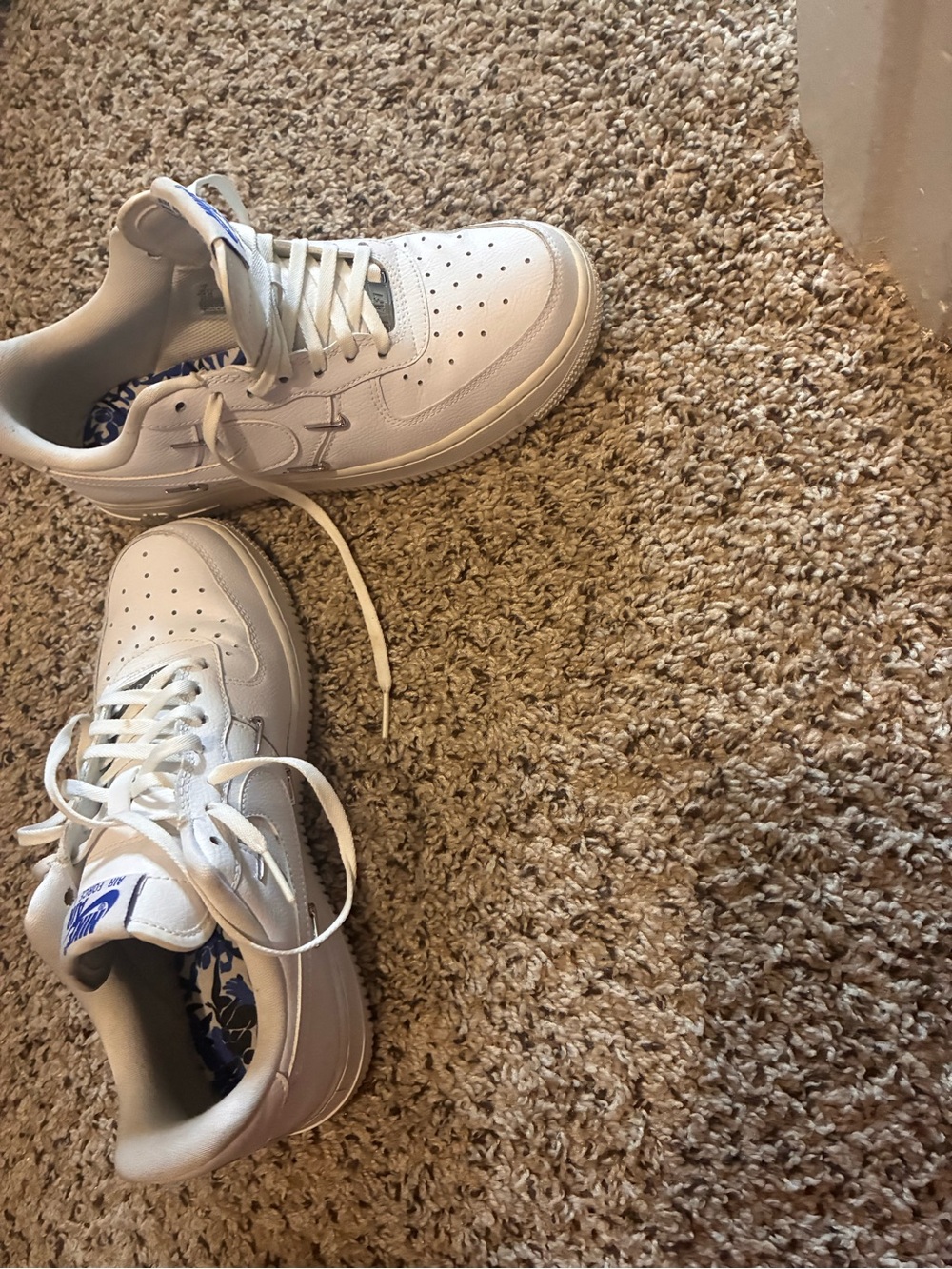 Nike Kids White Low-Top Sneakers with Blue Logo Accent